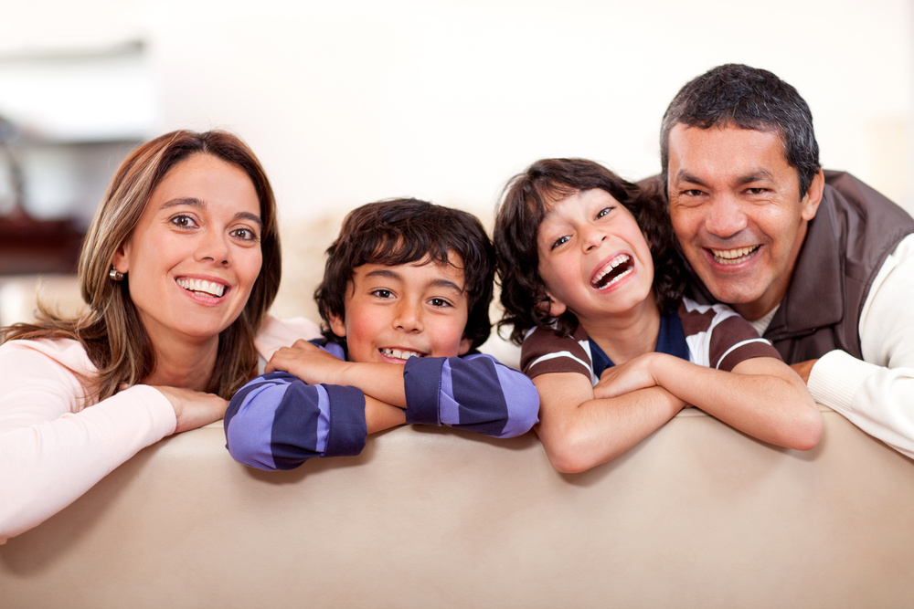 Happy family at home having fun and smiling
