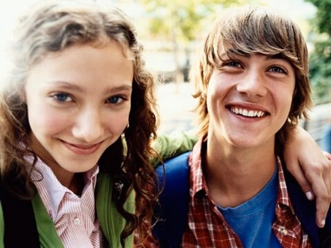 two young adults smiling