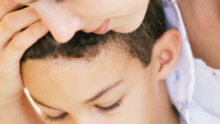 mother holding her son